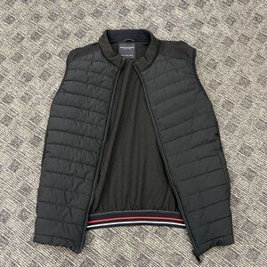 Black quilted vest Denim & Flower by Ricky Singh